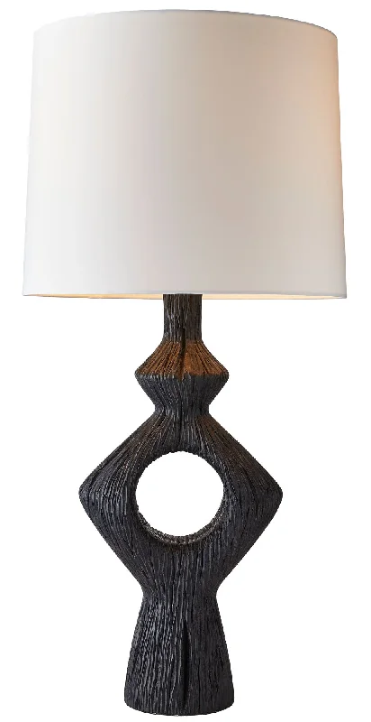 Track lighting for creating a moody atmosphereDeltoro Table Lamp